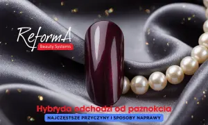 Elegancki, ciemny lakier hybrydowy na tle jedwabiu i pereł. Dowiedz się, dlaczego hybryda odchodzi od paznokcia i jak temu zapobiec.